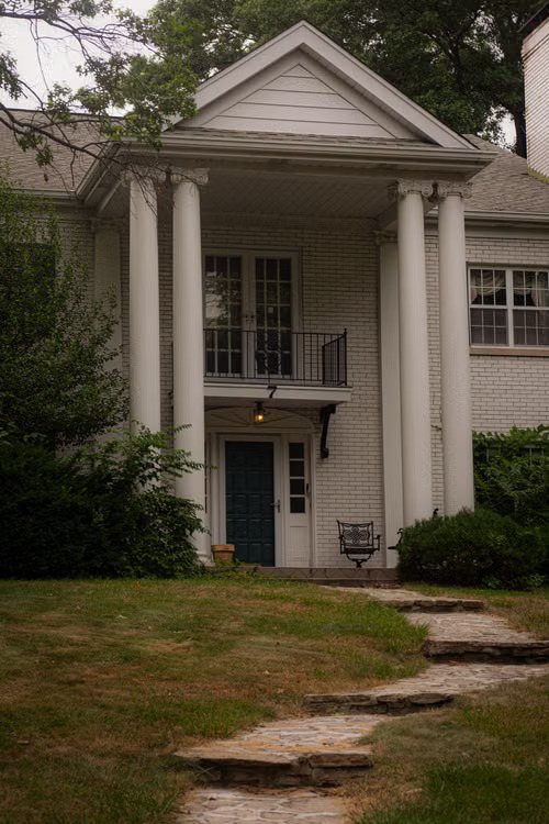 Residential home exterior with a well-kept entry